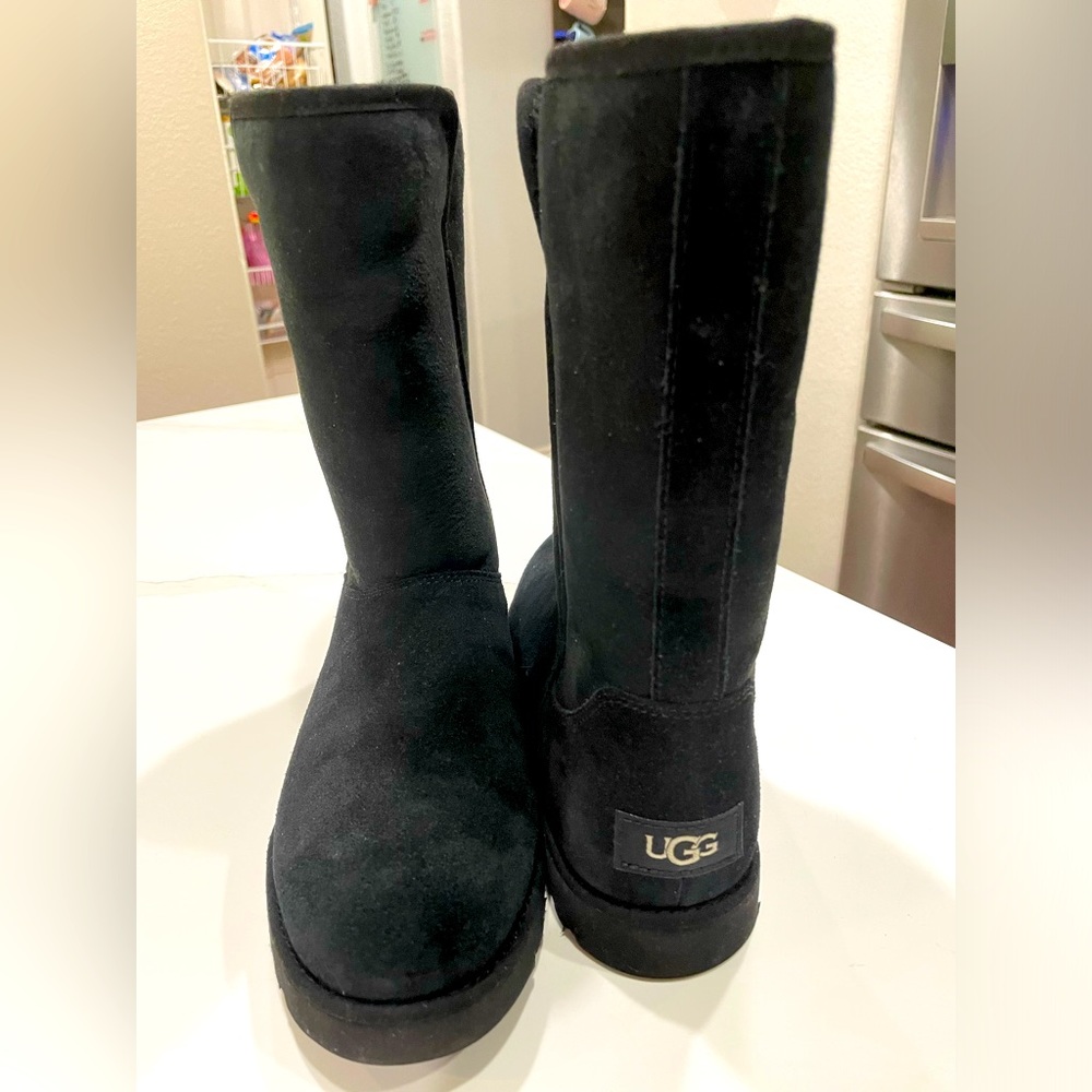 Womens black UGG Snow Boots, size 7 mid-calf winter UGG boots.
